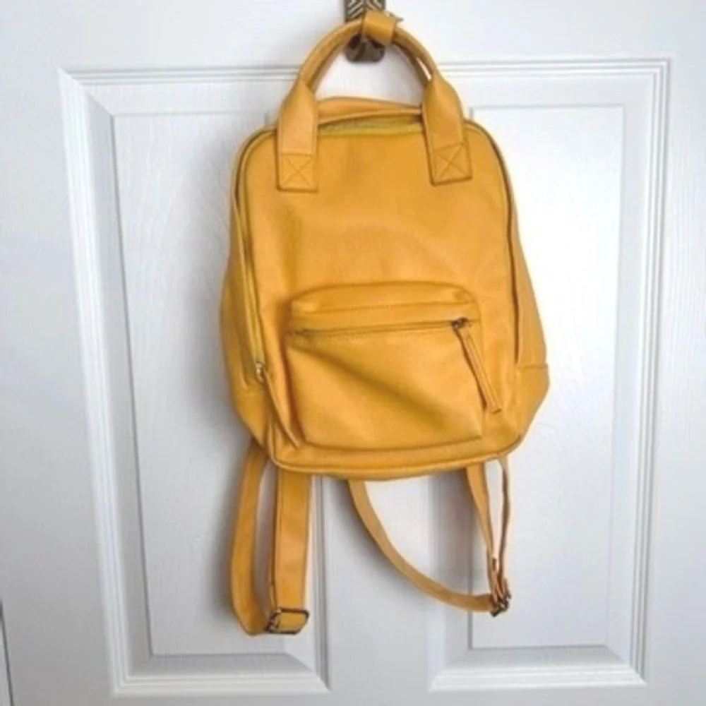 Yellow Faux Leather Small Backpack Pocket Front‎ Zip Closure Adjustable Straps